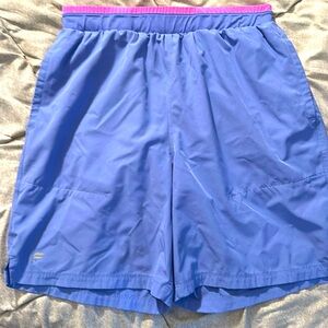 Fabletics Fundamental Short II in shadow blue 7”